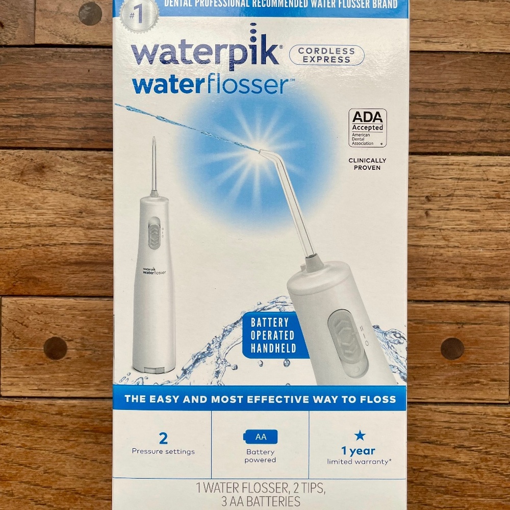 Waterpik Cordless Portable Water Flosser with 2 Settings, 2 Tips (USED 1x)